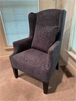 Clean blue upholstered wing back chair