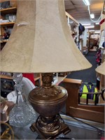 lamp with leatherish shade, with rip