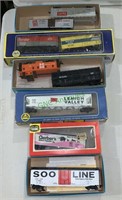 9 toy train model cars in six boxes - including a