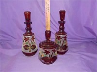 3 Frosted ruby glass decanters, sugar