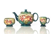 Three piece Moorcroft Freesia pottery tea set