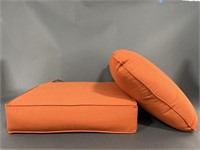 Two large Orange Patio Cushions