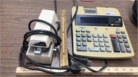 Texas Instrument calculator & electric stapler