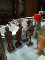 4 wood carved figures
