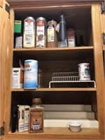 Contents of cabinet.Spices, depression glass