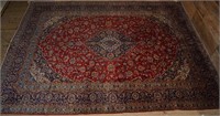 Approx. 9'8"x12'10" hand knotted Persian Kashan ca