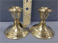 Pair of sterling silver candlesticks       (2)