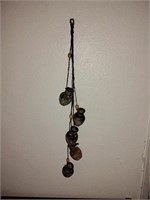 Mini pottery pots hanging from rope