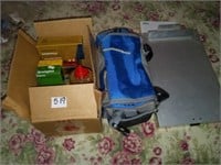 ammo, camera case, office clip board