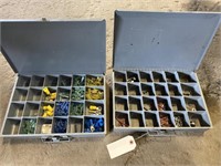 Two metal boxes with contents