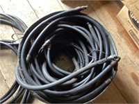 Tub full of various hydraulic hoses