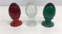 Three Fenton glass eggs. All are in good