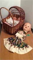Small wooden stroller and doll pieces