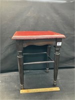 Small bench with leather top