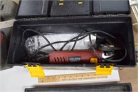 Red Corded Grinder in Plastic Toolbox