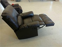 Brown rocker recliner chair has some damage