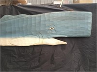 Carved wood Whale measures approximately 60"