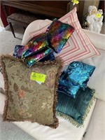 Large group of decorative pillows
