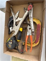 Vise grips, tape measure, tools