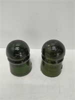 2 dark green insulators