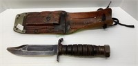 Vintage combat knife with sheaeth.    1733
