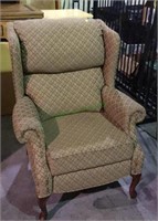 Very nice upholstered recliner wing back chair -