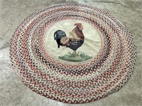 Circular braided chicken rug