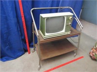 smaller 1960's tv on roller stand
