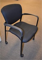 KIMBALL BLACK STACKING CHAIRS ON CASTORS