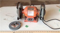 Bench grinder with extra wheel