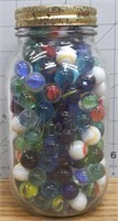 Kerr mason jar full of marbles