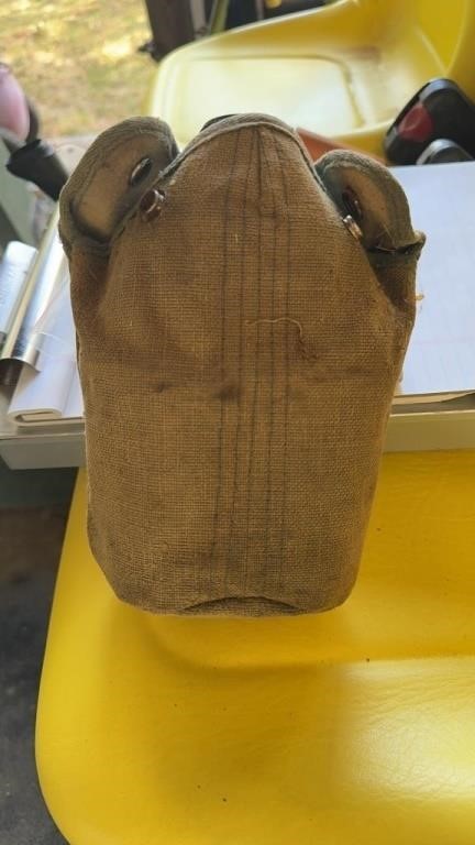 Vintage military canteen with cover