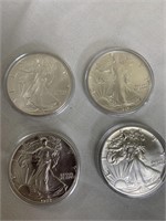 4 Silver Eagle coins