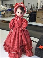 Doll on homemade stand