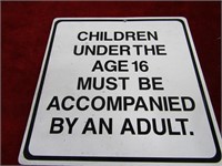 Metal sign. Children must accompanied Adult.