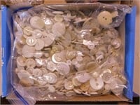 Bag of white sewing buttons