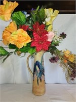 Unique pottery vase with faux flowers
