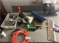 Misc. tool items on work bench in garage