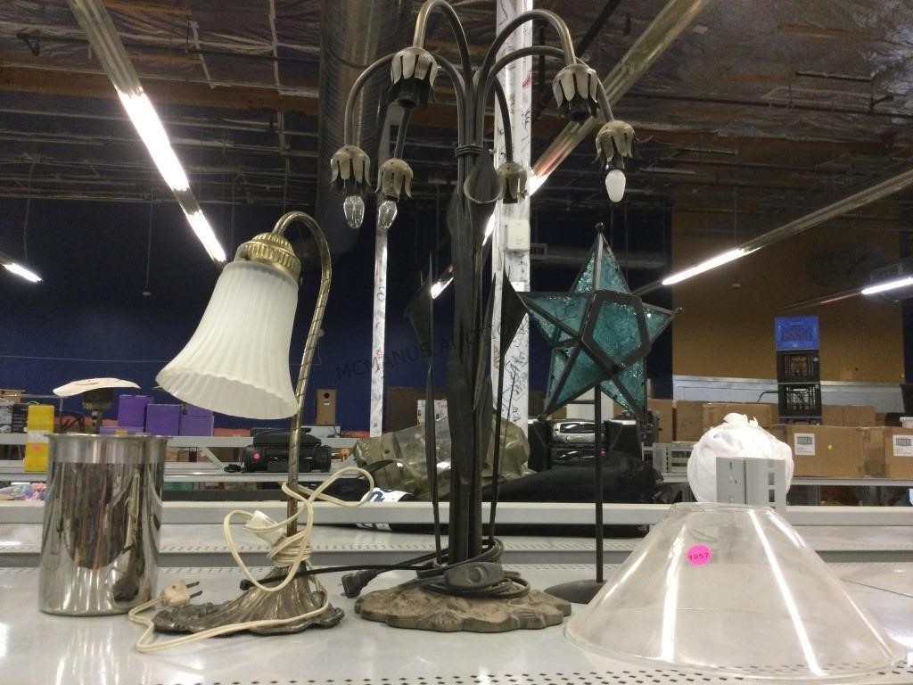 Assorted lamps and home decor. Metal base.
