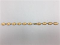 14 karat gold sea shell bracelet;
