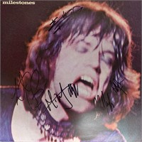 The Rolling Stones Milestones signed album. GFA Au