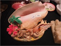 Tabletop conch shell light decorated with