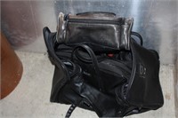 2 leather bags Sm. Garage