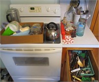 Items on stove & in drawer