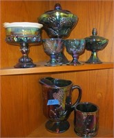 Carnival glassware in cabinet