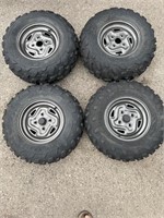 Like new Dunlop ATV tires $ Kawasaki rims (2)-