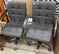 Pair Of Modern Rolling Arm Chairs