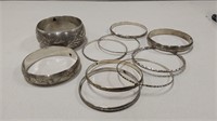 Silver toned bracelets ?sterling