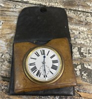 Neat lil Swiss made clock in leather sleeve