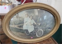 Convexed Framed Woman on a Motorcycle